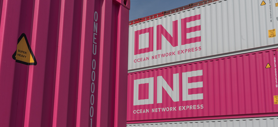 Stacked Ocean Network Express shipping containers at a logistics terminal
